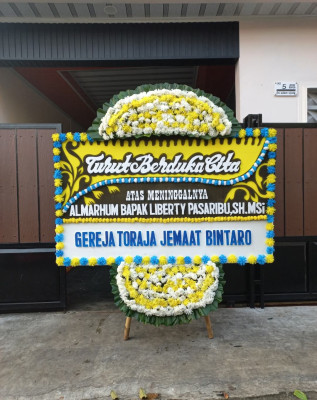 Papan Bunga Duka di Bujak